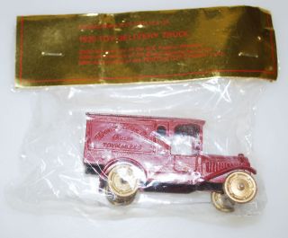 TOOTSIE TOY  COMMEMORATIVE REPLICA OF 1925 TOY DELIVERY TRUCK, MAROON 