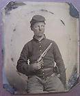  soldier in Union uniform with Colt Army Model 1860 revolver