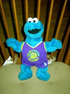 Sesame Street Cookie Monster plush doll sport outfit on