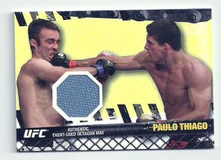   MMA TOPPS FIGHTER EVENT USED OCTAGON MAT RELIC PAULO THIAGO RARE SP