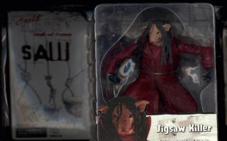 Saw III Jigsaw killer features puppet and tricycle