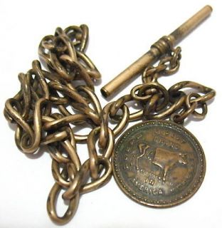 ANTIQUE GOLD BAUGH COW MANURE WATCH FOB AND CHAIN 11 1/4
