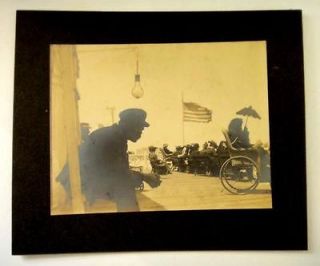 antique PHOTOGRAPH~BLA​CK MAN,FLAG, BULB, WHEELCHAIR,PAR​ASOL 