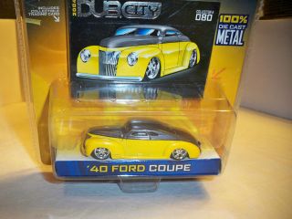 JADA 1/64 DUB CITY YELLOW AND GREY 1940 FORD COUPE NEW IN PACK MIP NIP