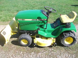John Deere 160 SNOWPLOW TRACTOR with deck, ag tires and snow chains 