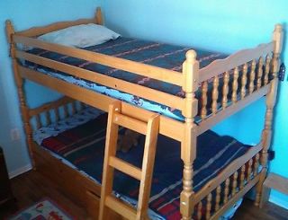 Wood bunk bed with ladder and storage drawers