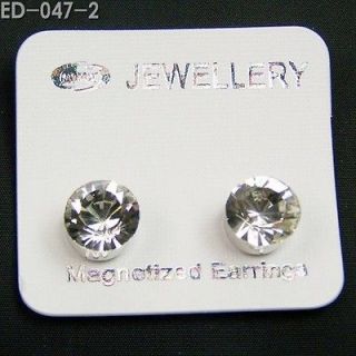 Newly listed WHOLESALE 12 white 4mm MAGNETIC Earrings Studs