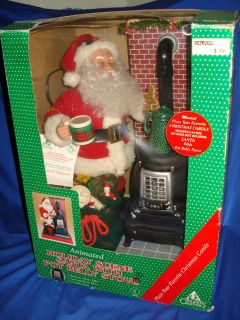   1994 ANIMATED MUSICAL LIGHT UP CHRISTMAS SANTA WITH POT BELLY STOVE