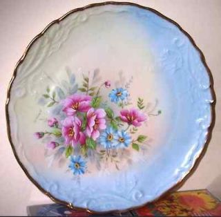 FRENCH LIMOGES PLATE Decorated in a stunning floral display