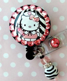 HELLO KITTY NURSE BLING ID REEL BADGE HOLDER with Charms
