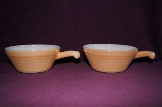 Fire King lot of 2 copper tint cassrole dishes handled French onion 