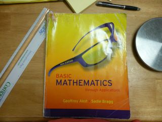   Mathematics Through Applications by Geoffrey Akst and Sadie Bragg