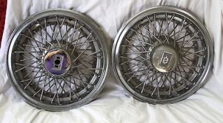 VINTAGE LOT OF TWO OLDSMOBILE WIRE SPOKE HUBCAPS