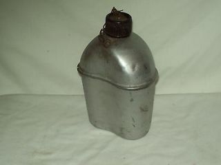 Vintage WW II Aluminum Canteen with attached cap stamped U.S. S.M. CO 