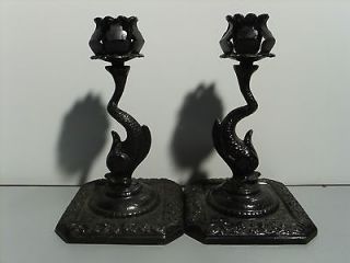 Pair Of Cast Iron Dolphin Candlestick Holders