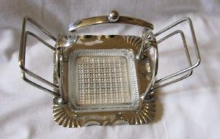 Unusual vintage silver plated toast rack and butter dish combined