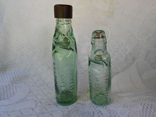 Two Codd Bottles with Opener   9 3/4 & 6 3/4 Tall Glass Has a Green 