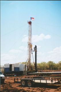 TRAILER MOUNTED OIL WELL DRILLING RIG