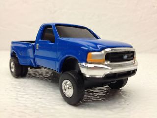 64 ERTL FORD F 350 LT. BLUE DUALLY