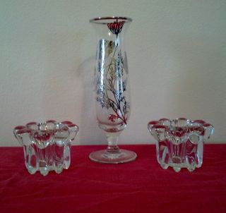   bud vase with silver filigree overlay and two glass candle holders