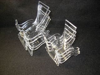 set of clear plastic display stands 4 medium 4 large