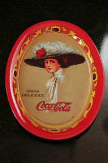 coca cola red oval tin tray w 1909 coke calendar