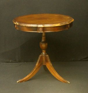 mahogany pie crust accent end table with a tripod base
