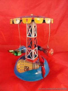 FANTASTIC VINTAGE STYLE TINPLATE SPACE CAPSULE CAROUSEL WIND UP TIN 