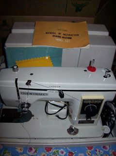 janome, new home,model 537 portable sewing machine with manual and 