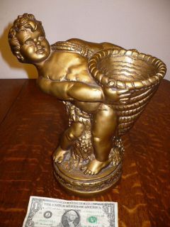 vintage universal statuary corp cherub holding cornacopia 