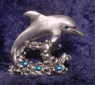 pewter dolphin jumping waves with colorful crystals 