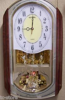   Quartz Oblong Rotating Musical Melody Pendulum Wall Clock Youngtown