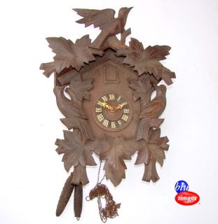 an antique black forest cuckoo clock marked regula made in germany 