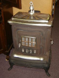 Antique Double Star Parlor Wood Stove