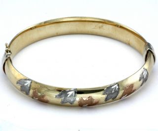 14k yellow gold and silver bangle bracelet with hidden clasp