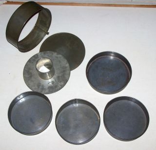   Lot of 4 Baking Pans and One Antique Tin Cheese Cake 3 piece Pan Bundt