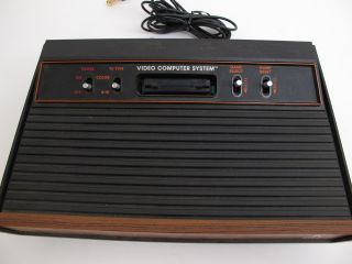 Atari 2600 Bundle with 11 Games, 2 Joysticks, Paddles, Booklets