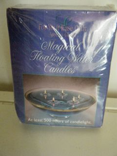    Magical Floating water Candles 2 sets of 5 500 hours of candle light