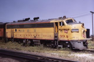   Slide MILW Milwaukee Road FP7A #99A @ Bensenville IL   UP Yellow Paint