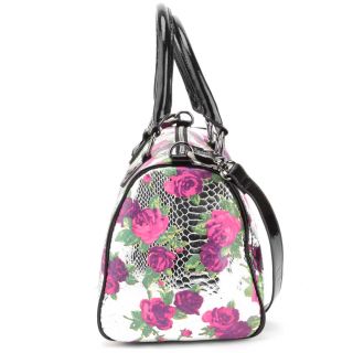 This Betseyville Rosey Days Satchel  overlays a floral print with 
