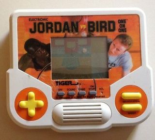   Jordan vs. Larry Bird TIGER ELECTRONIC HANDHELD BASKETBALL GAME