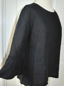 bryn walker cute black shirt with flared sleeves