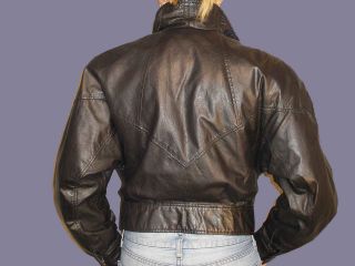 label byrnes and baker fabric content 100 % leather lining is 100 % 