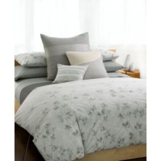   of luxury with the Quince comforter from Calvin Klein. A watercolor
