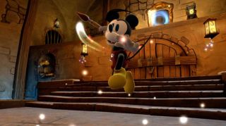 Mickey Mouse using his magical brush in Disney Epic Mickey 2 The 
