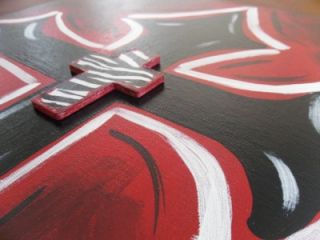 hand painted cross on canvas with zebra cross center
