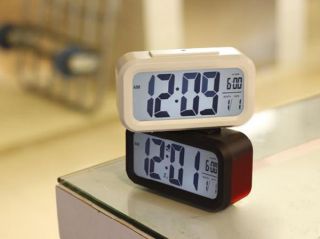 LCD Digital Snooze Alarm Clock with White LED Backlight Calendar