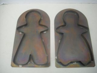 large copper gingerbread boy and girl cookie cutters