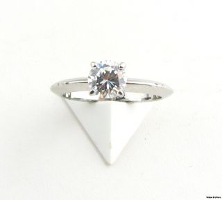 pretty ring is done in an engagement style set with a 6mm round cut CZ