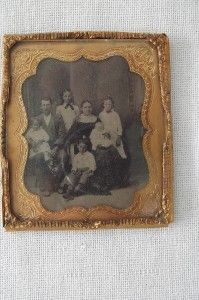 Delightful Daguerreo Type photo of unknown family. The photo is set